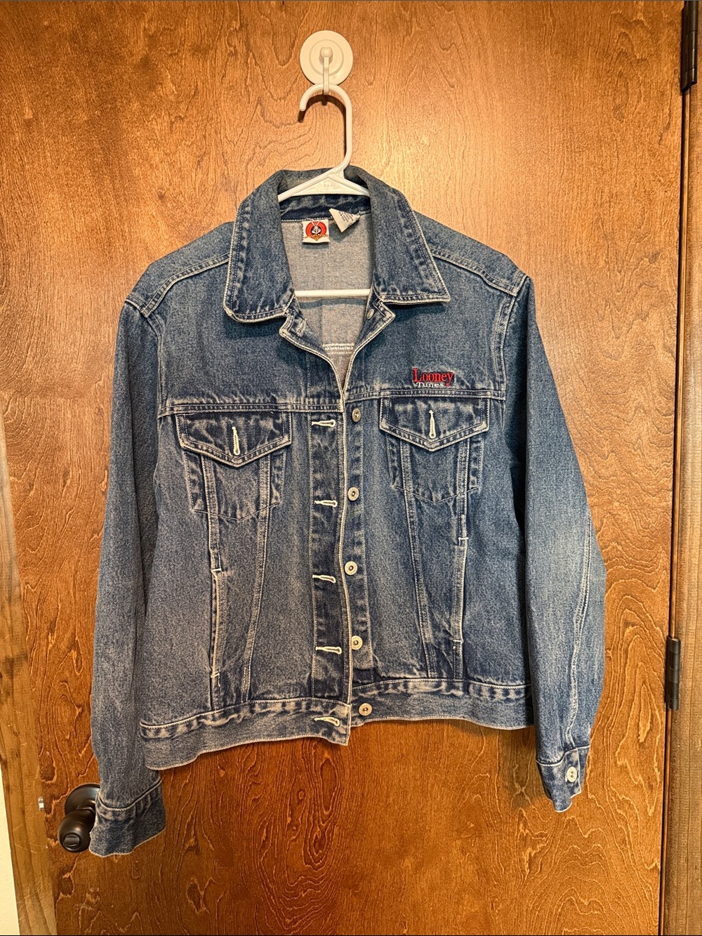 Warner Bros. Looney Tunes Denim Jean Jacket in Medium Blue with Red Logo